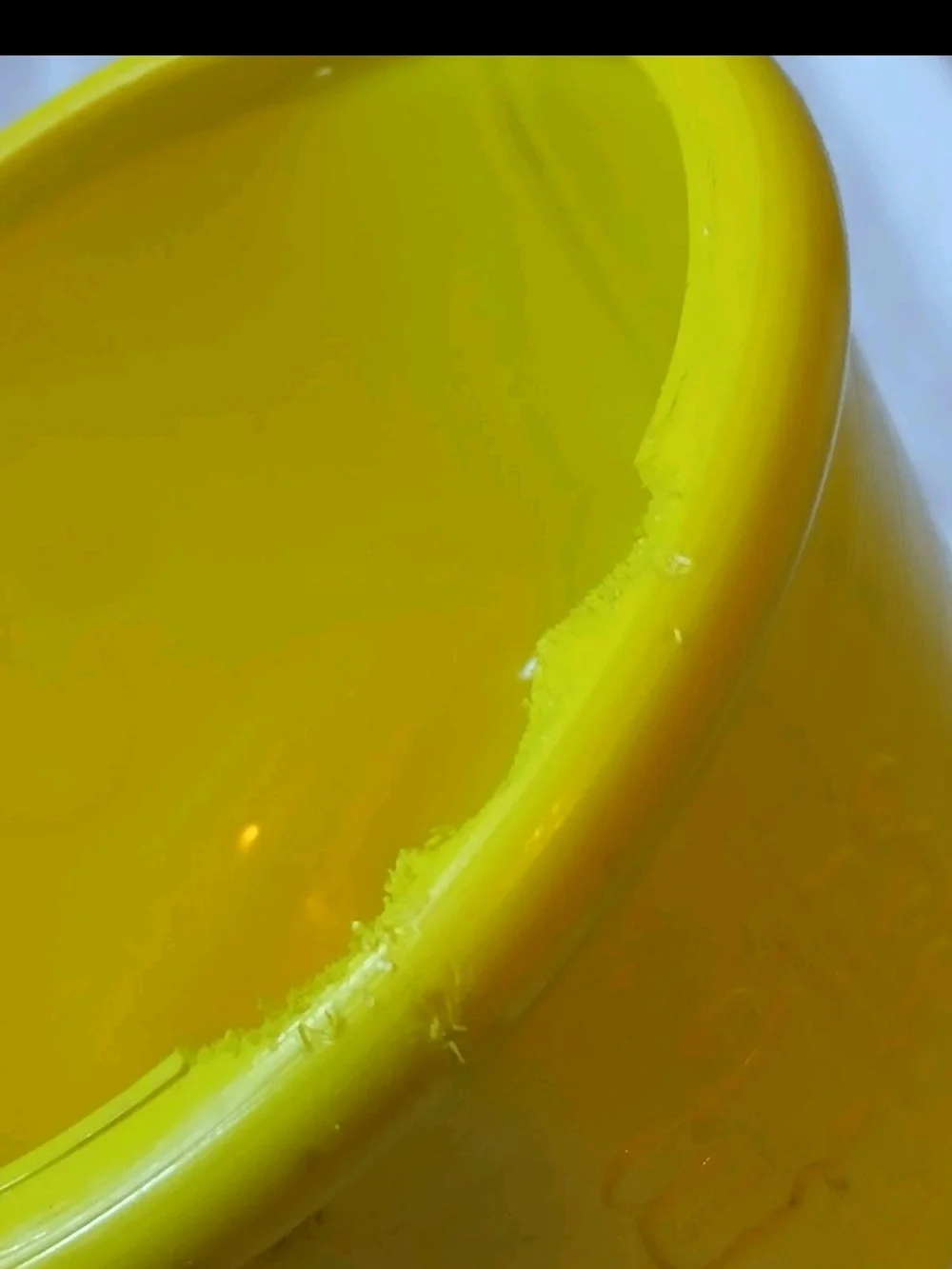 The First Years Yellow Smiley Toy Cooking Pot with Handle for Ages 12-18 Months